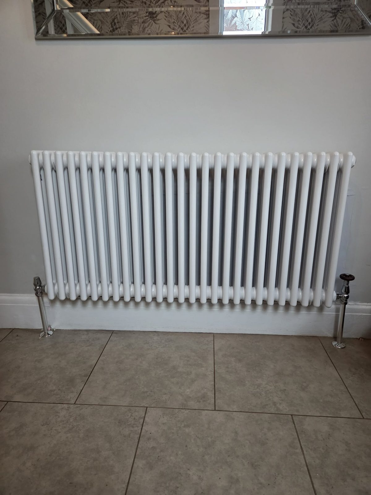 Column radiator installation in Burnley